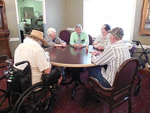group of men meeting around a table